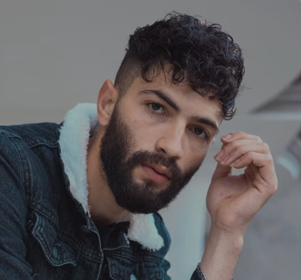 Bearded man looking down portrait